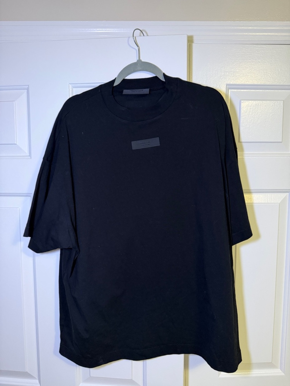 Essentials Black Short-Sleeve Crewneck Tee with Minimal Chest Patch